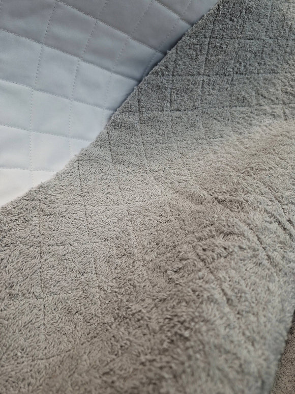 TESSUTO SPUGNA CON PELLICOLA IMPERMEABILE